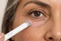 Apply a little pink cream with a precision brush